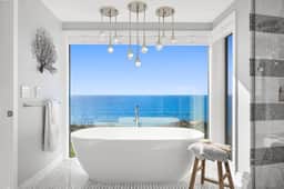 Distinguished Oceanfront Point Estate with Iconic Beach + Mountain Vistas