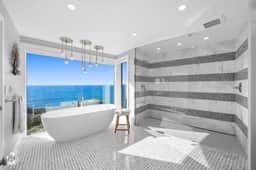 Distinguished Oceanfront Point Estate with Iconic Beach + Mountain Vistas