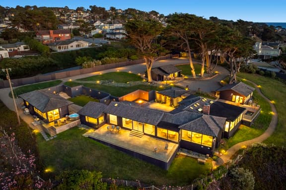 Distinguished Oceanfront Point Estate with Iconic Beach + Mountain Vistas